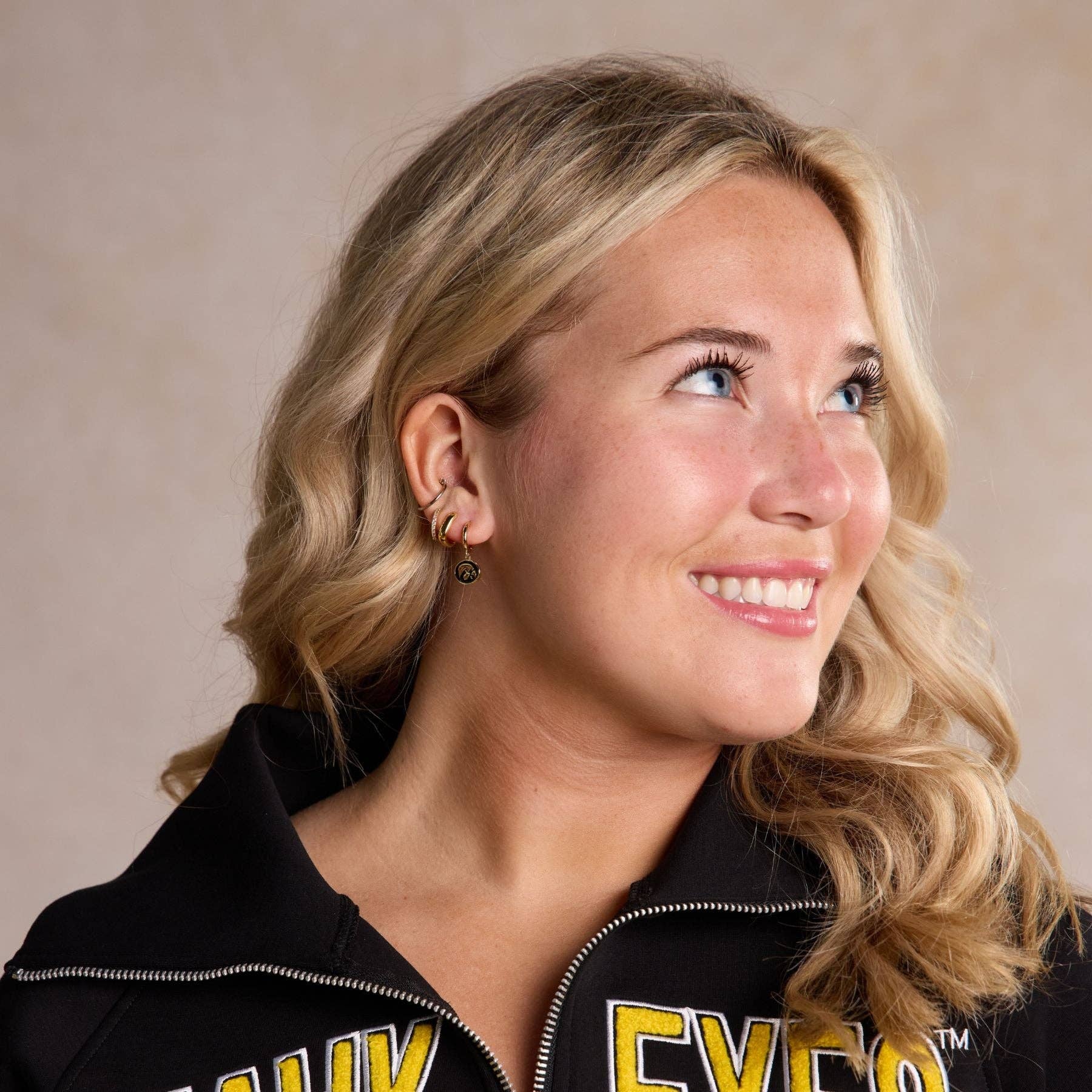 University of Iowa Tigerhawk Gold Huggies Earrings | The Tinsel Thread